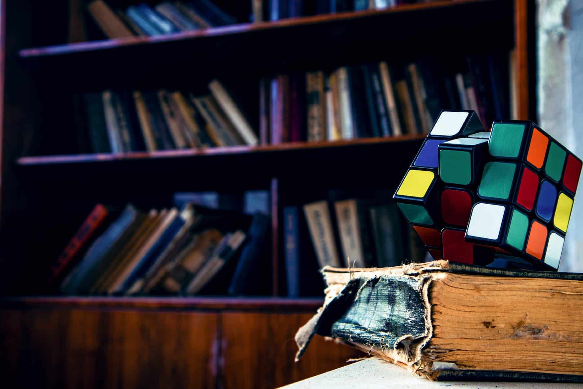 rubik s cube on book