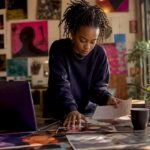 Musician preparing electronic press kit at home