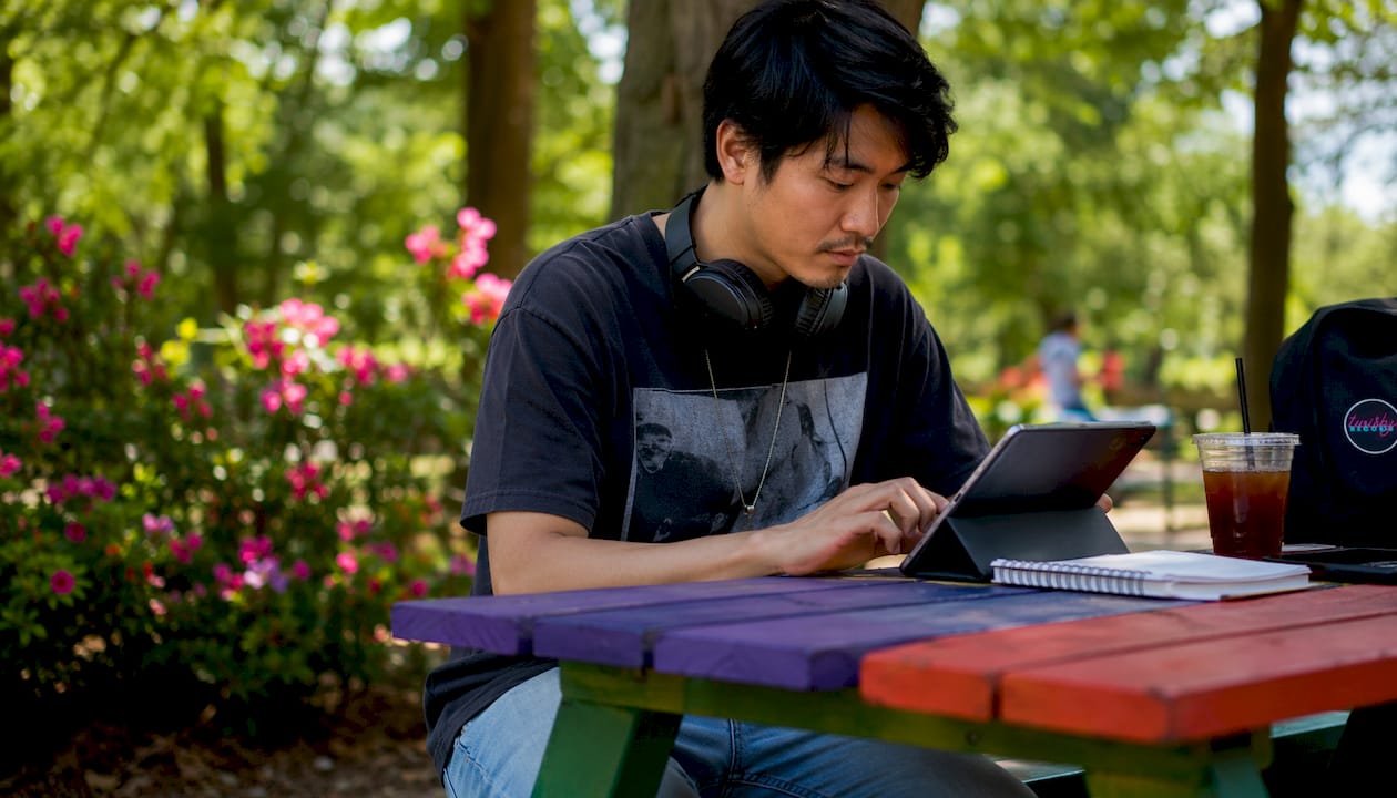 Musician editing audio preview on tablet