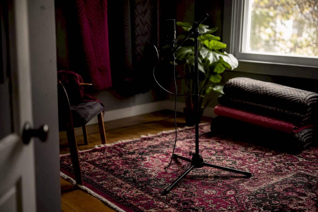 Area rug under microphone stand in home studio