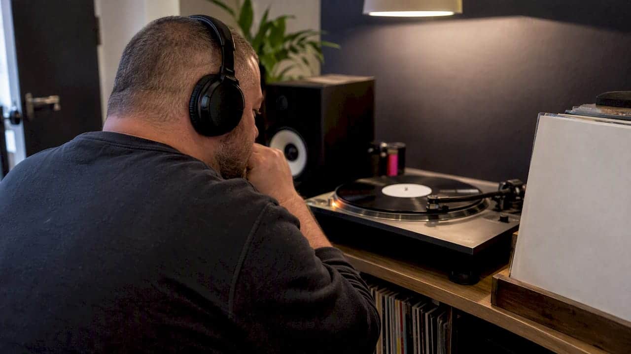 Artist listening to a vinyl test pressing